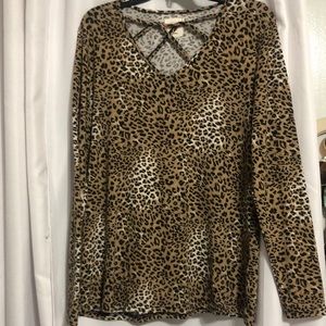 Animal print long sleeve shirt.  Size small fits a lot bigger.